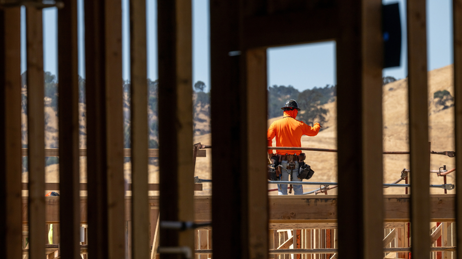 A worker at the site of a new home construction.