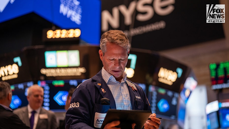 Traders on the floor of the New York Stock Exchange.